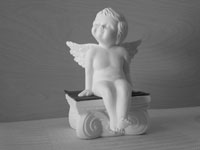 Engel auf Bank